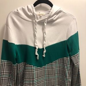 White black and green sweatshirt.